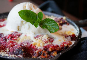 Blackberry cobbler made in a cast iron skillet