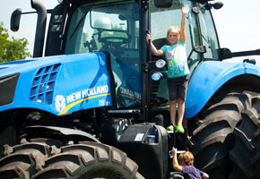 kids climbing on a tractor