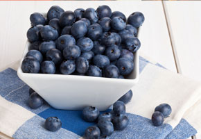 a beautiful bowl of blueberries