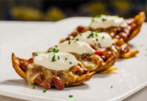 Cilantro-Lime Black Bean Potato Skins on a white plate