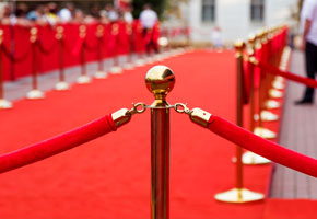 hollywood red carpet with a red velvet divider in front focus