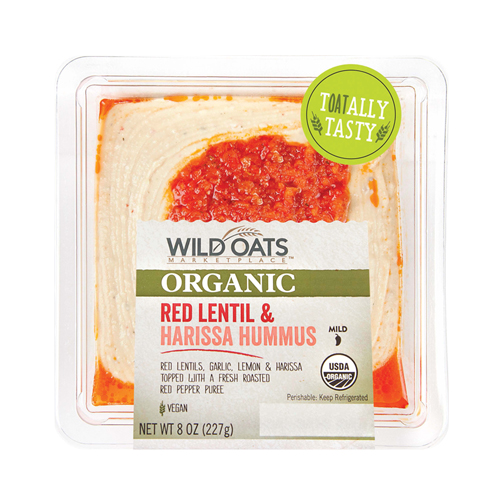 a photo of a package of wild oats marketplace organic red lentil and harissa hummus